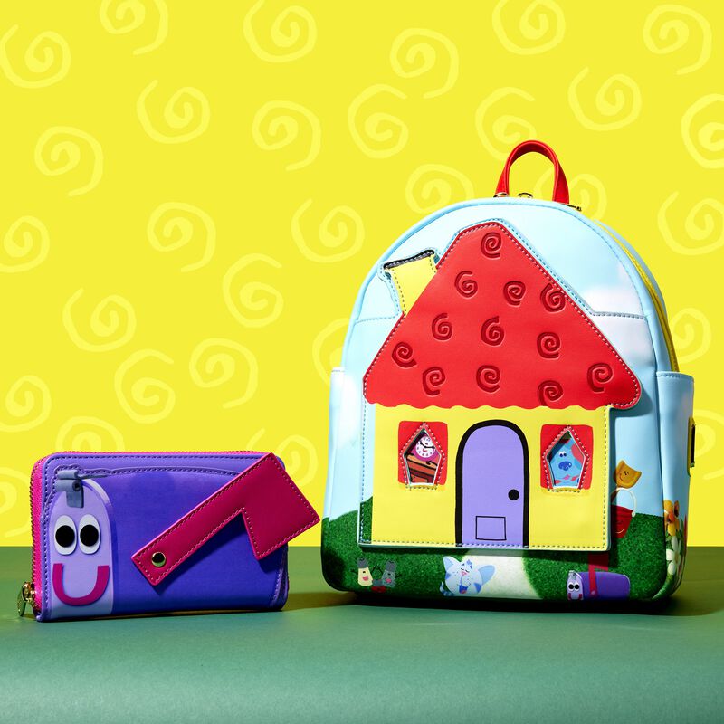 Blue's Clues mini backpack featuring the house and the mailbox wallet side by side against a yellow background